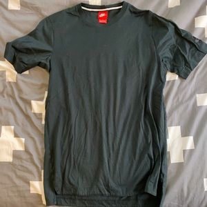 Men’s dark green Nike pre-shrunk 100% cotton shirt